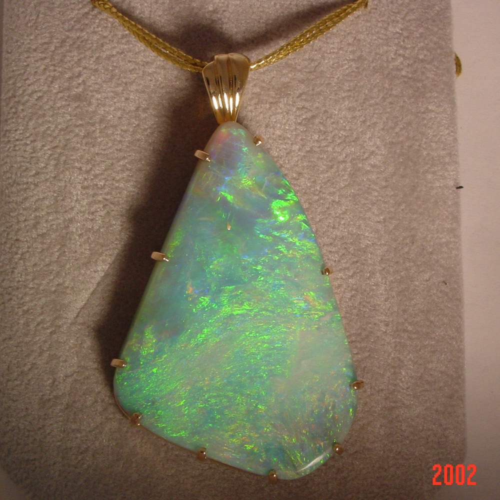 14k Yellow Gold free form Opal Pendant